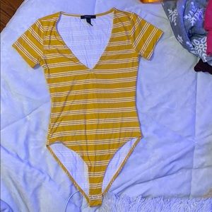 yellow bodysuit